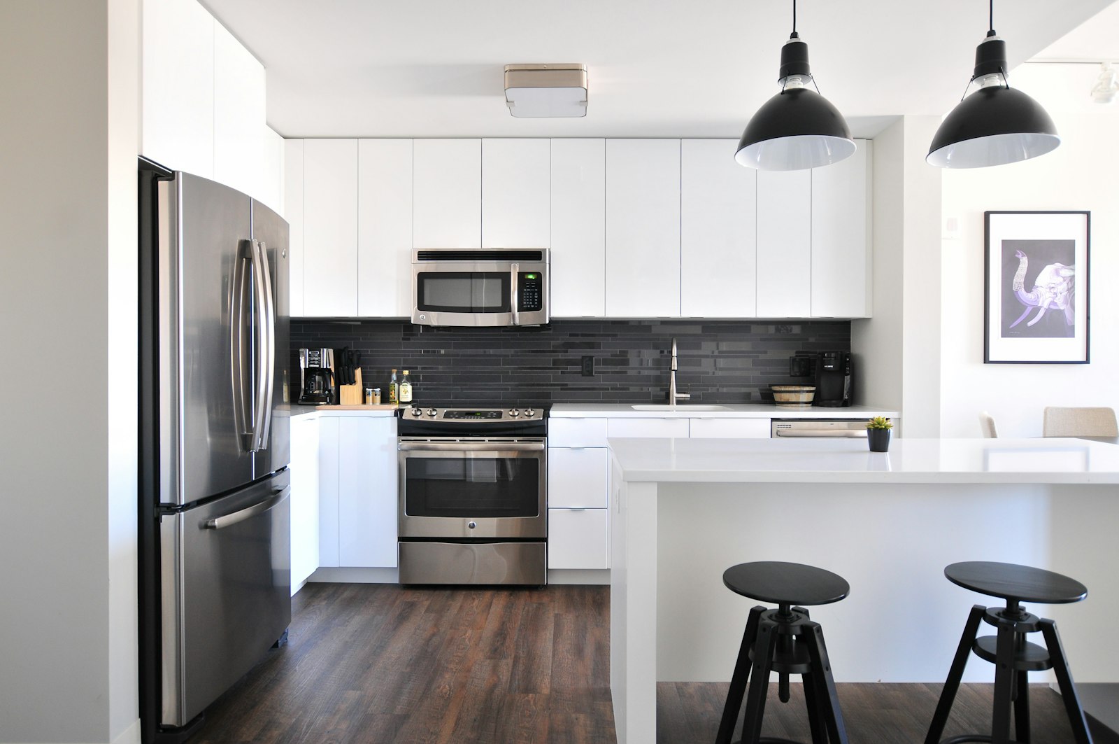 Bright, calm modern kitchen interior — the everyday weight of post-divorce housing decisions.
